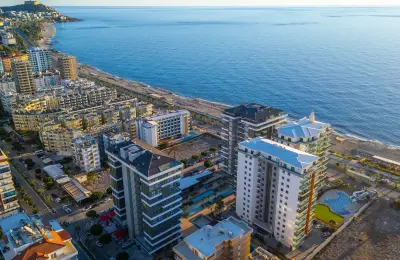 Alanya Mahmutlar'da Denize Sıfır Özel Plajlı 5+2 Ultra Lüks Kupon Penthouse | Vatandaşlığa Uygun