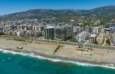 Alanya Mahmutlar'da Denize Sıfır Özel Plajlı 5+2 Ultra Lüks Kupon Penthouse | Vatandaşlığa Uygun