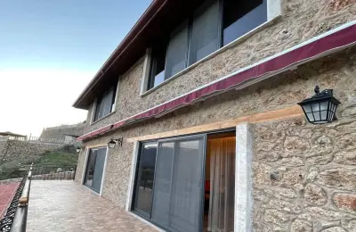 5+2 Luxury Detached Stone Mansion with 839 m² Plot Built with Tosmur Stone in Alanya
