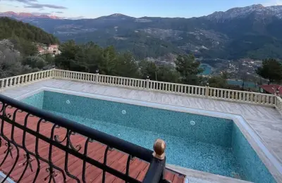 5+2 Luxury Detached Stone Mansion with 839 m² Plot Built with Tosmur Stone in Alanya