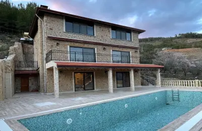 5+2 Luxury Detached Stone Mansion with 839 m² Plot Built with Tosmur Stone in Alanya
