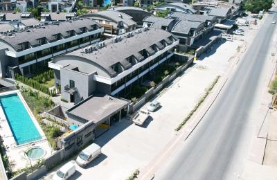Ivy Flats: Элитные Дуплексы и Квартиры с Садом в Коньяалты, Район Молла Юсуф