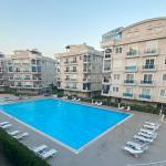 Gardenya Evleri: Furnished Apartment for Sale in Hurma, Walking Distance to Beach & Indoor Parking