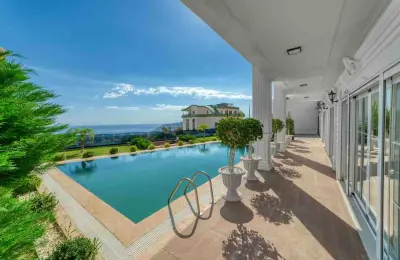 Sovereign 5+1 Triplex Eco-Luxury Mansion in Alanya Tepe with Panoramic Sea & Castle Views